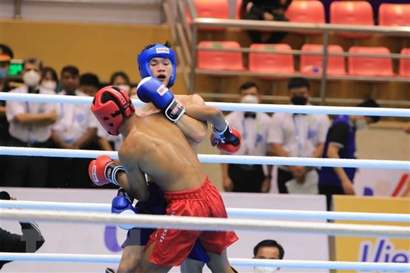 SEA Games 31: Kickboxing Viet Nam, Thai Lan the hien suc manh o Tu ket hinh anh 1
