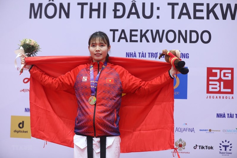 SEA Games 31: Taekwondo nữ Việt Nam xuất sắc giành 2 Huy chương Vàng hình ảnh 1 SEA Games 31: Taekwondo nu Viet Nam xuat sac gianh 2 Huy chuong Vang hinh anh 1