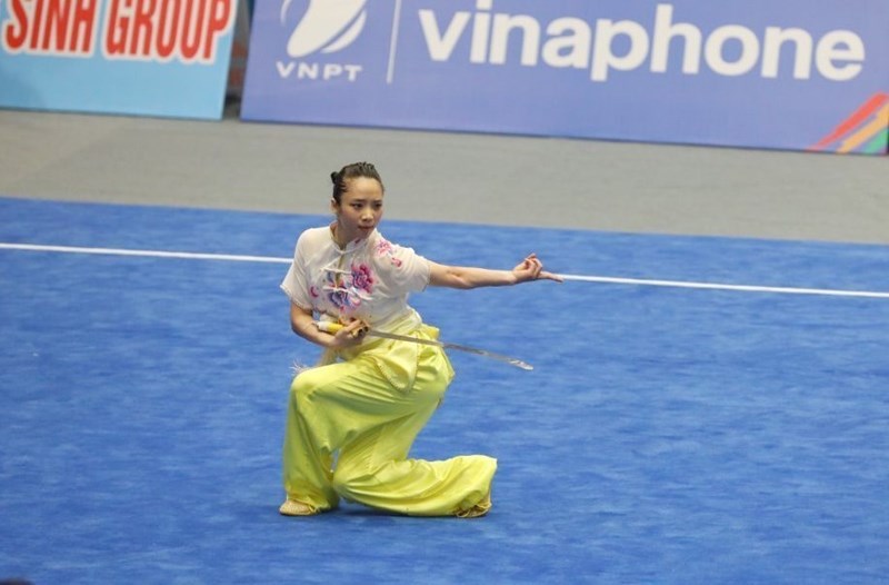 SEA Games 31: Vietnamese wushu athletes win two gold medals on first competing day hinh anh 1