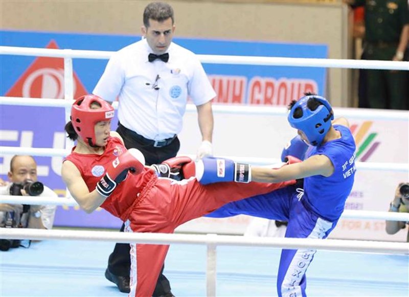 SEA Games 31: Vietnam secures two first gold medals in kickboxing hinh anh 1