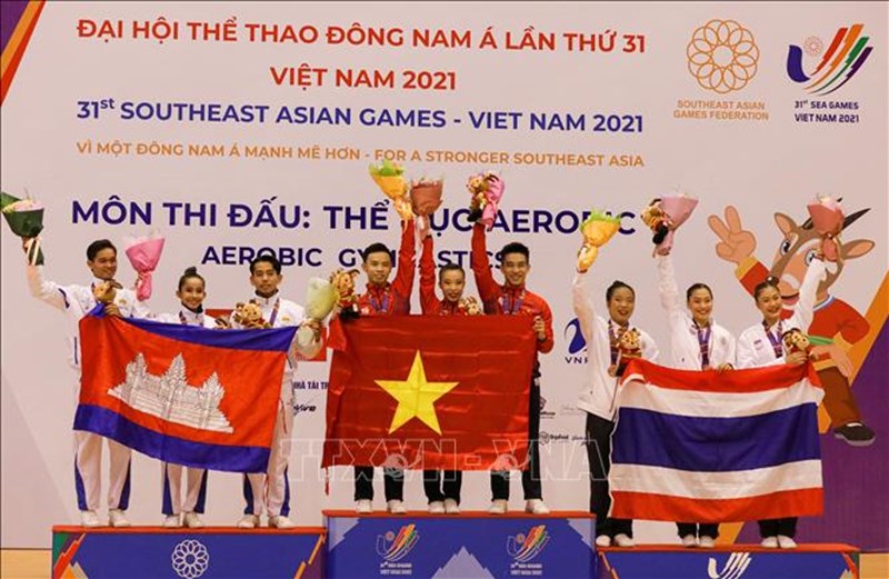 SEA Games 31: Vietnamese aerobic gymnasts earn gold in first competition day hinh anh 1